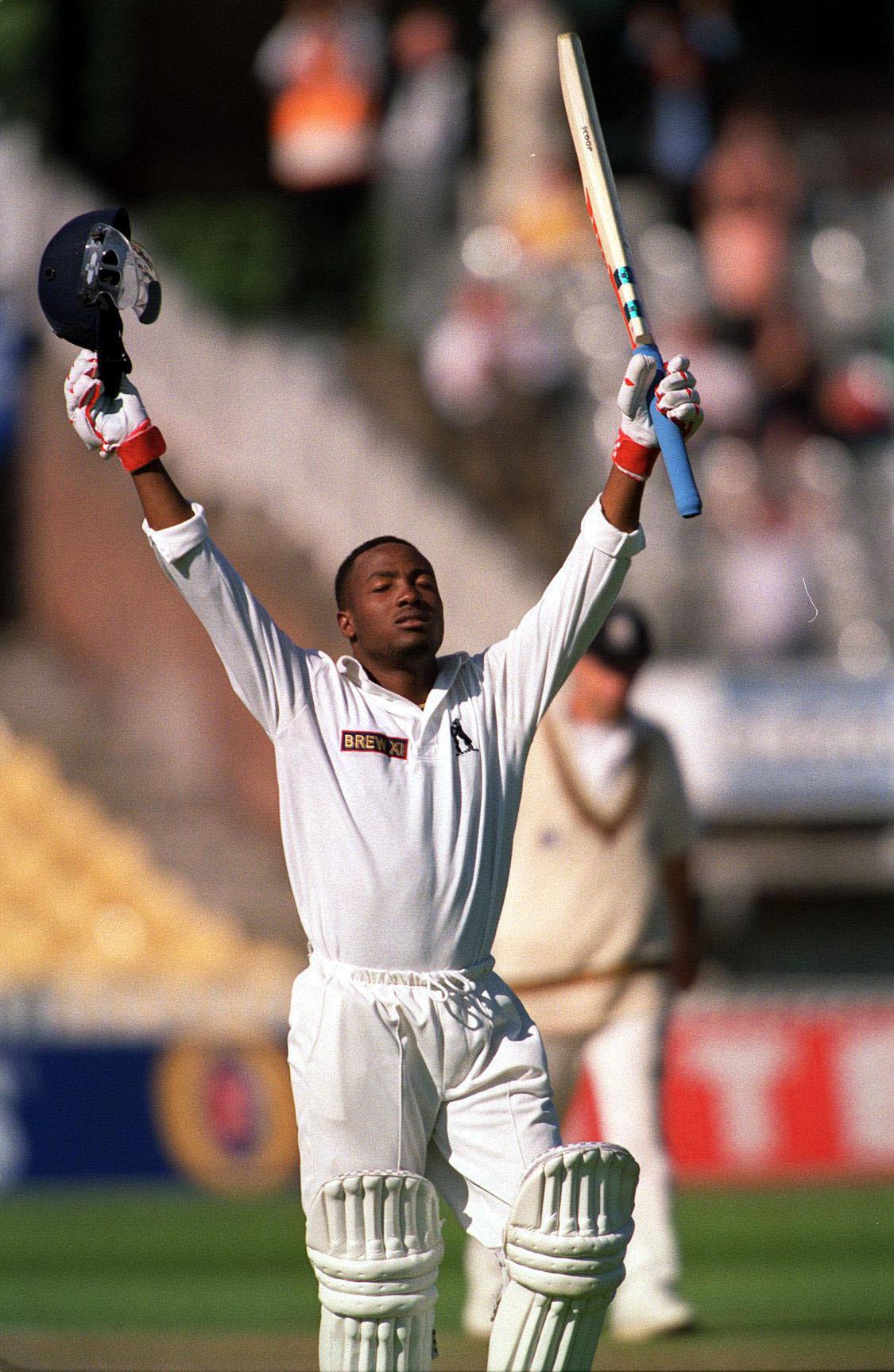 Brian Lara celebrates his 501 for Warwickshire at Edgbaston in 1994. Photograph © Graham Morris (Tel: +44[0]20 8969 4192; Fax: +44[0]20 8960 0018; Email: info@cricketpix.com)